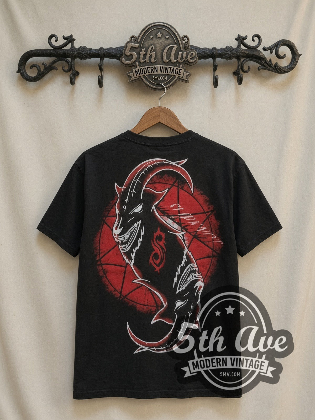 Slipknot Band Circle Nonagram all-over-print vintage band t-shirt in black, back view on a display rack