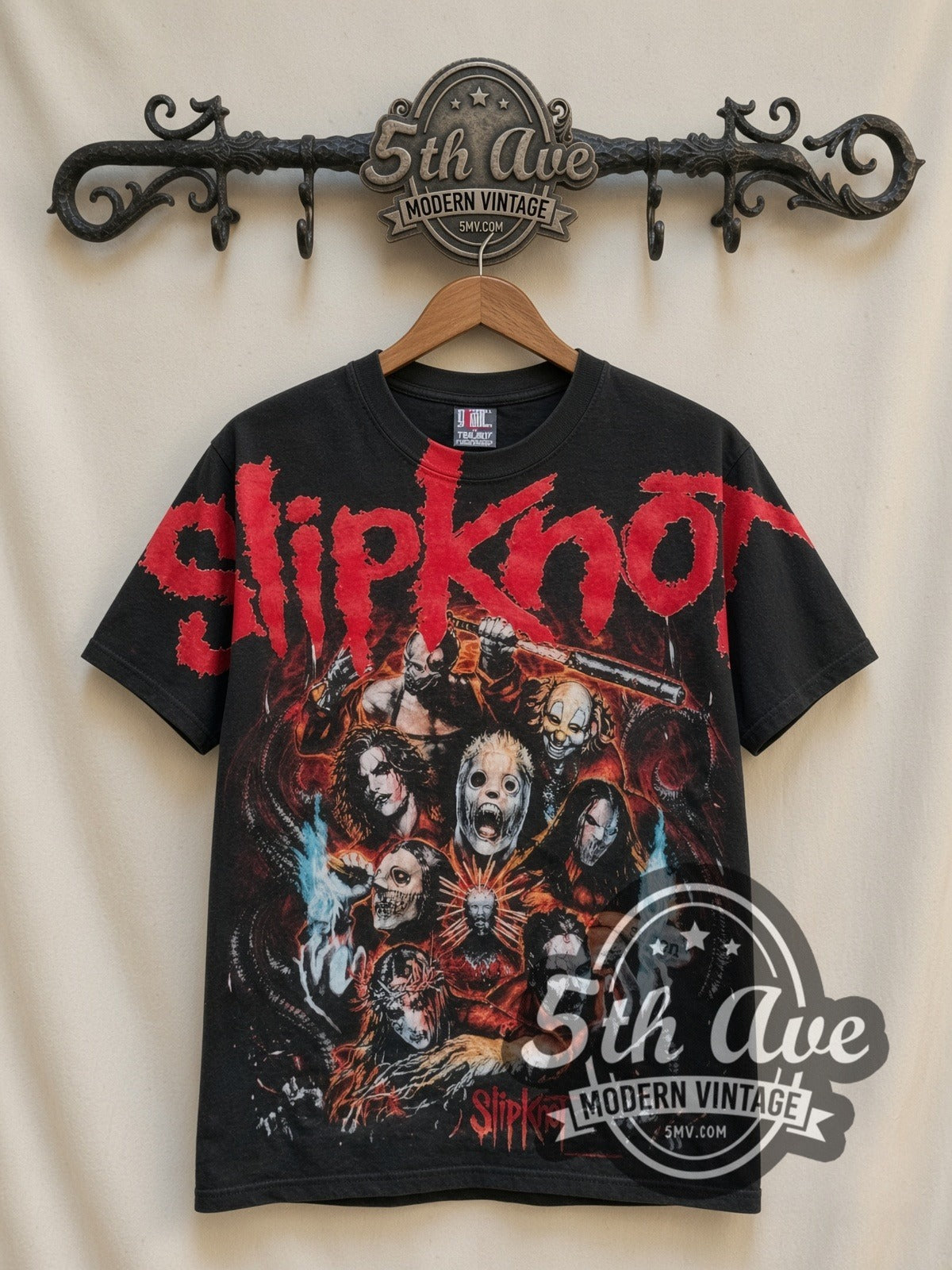 Slipknot Band Circle Nonagram all-over-print vintage band t-shirt in black, front view on a display rack
