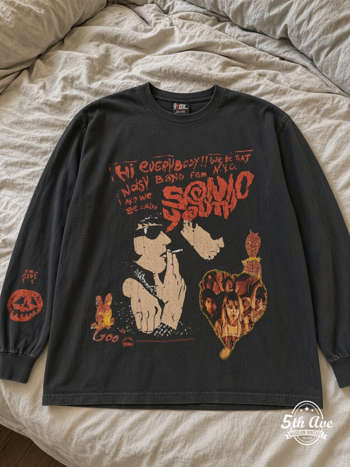 Sonic Youth Goo / Noisy Band from N.Y.C. Long Sleeve vintage tee laid on bed