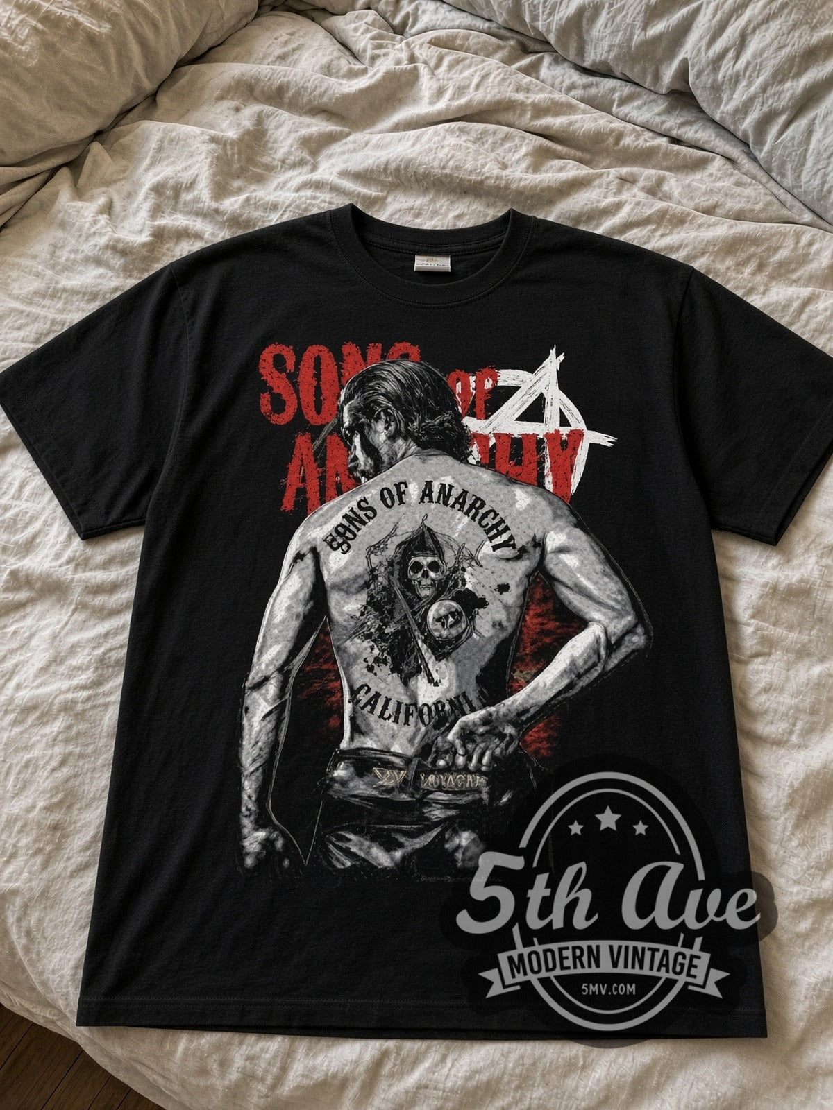 Sons of Anarchy Jax Back Patch black graphic tee laid flat on linen bed