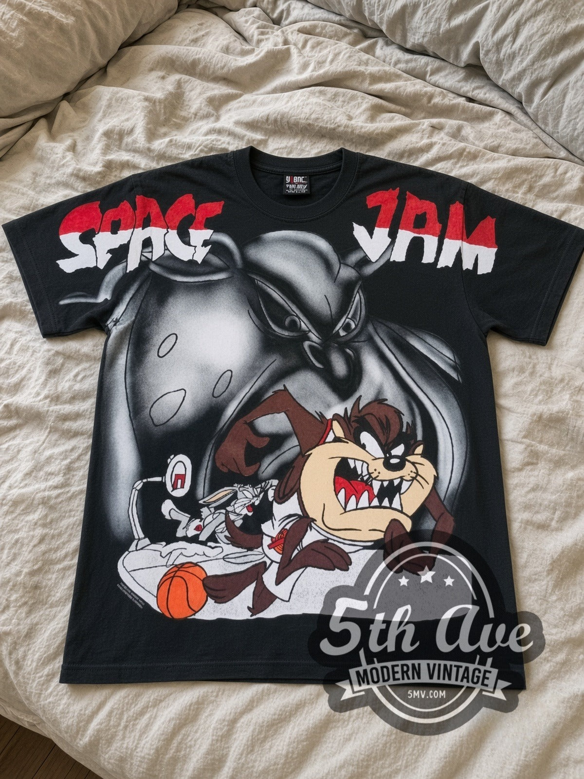 Space Jam Taz & Monstar all-over-print vintage cartoon tee in black laid flat