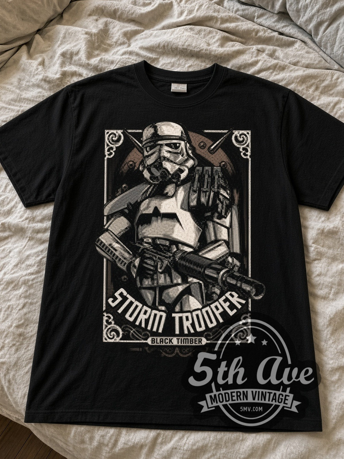 Star Wars Stormtrooper Frame black graphic tee laid flat on linen bed