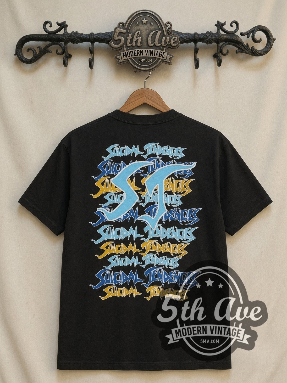 Suicidal Tendencies Logos Skeleton V2 all-over-print vintage band t-shirt, back view on a display rack