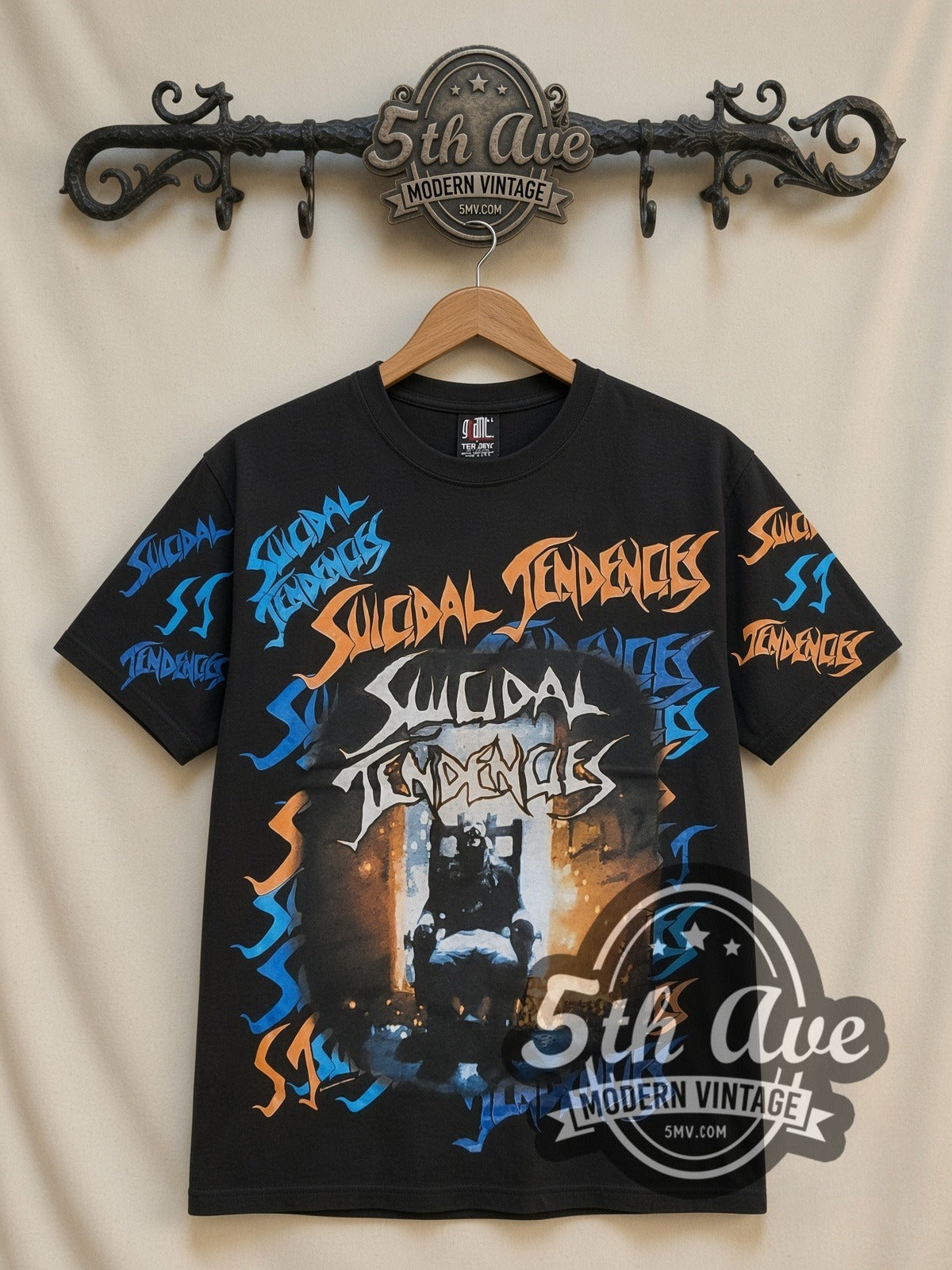 Suicidal Tendencies Logos Skeleton all-over-print vintage band t-shirt in black, front view on a display rack