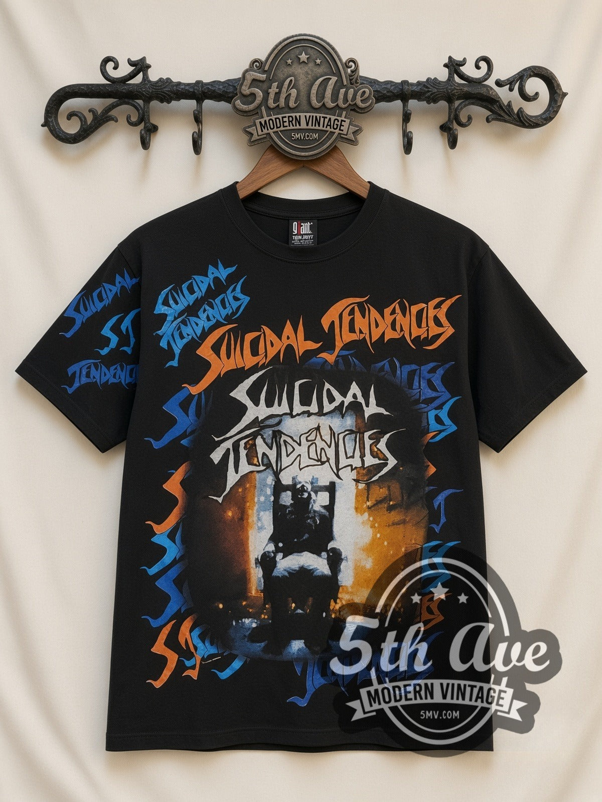 Suicidal Tendencies Logos Skeleton V2 all-over-print vintage band t-shirt, front view on a display rack