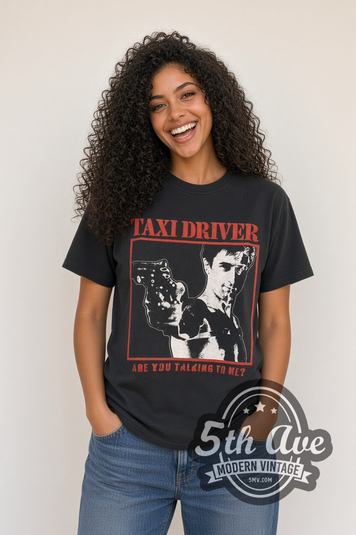 Woman wearing black Taxi Driver vintage movie t-shirt