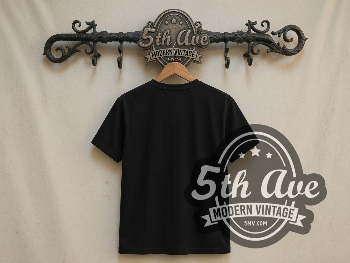 Plain black back of Teenage Mutant Ninja Turtles Four Turtles double stitched tee on rack