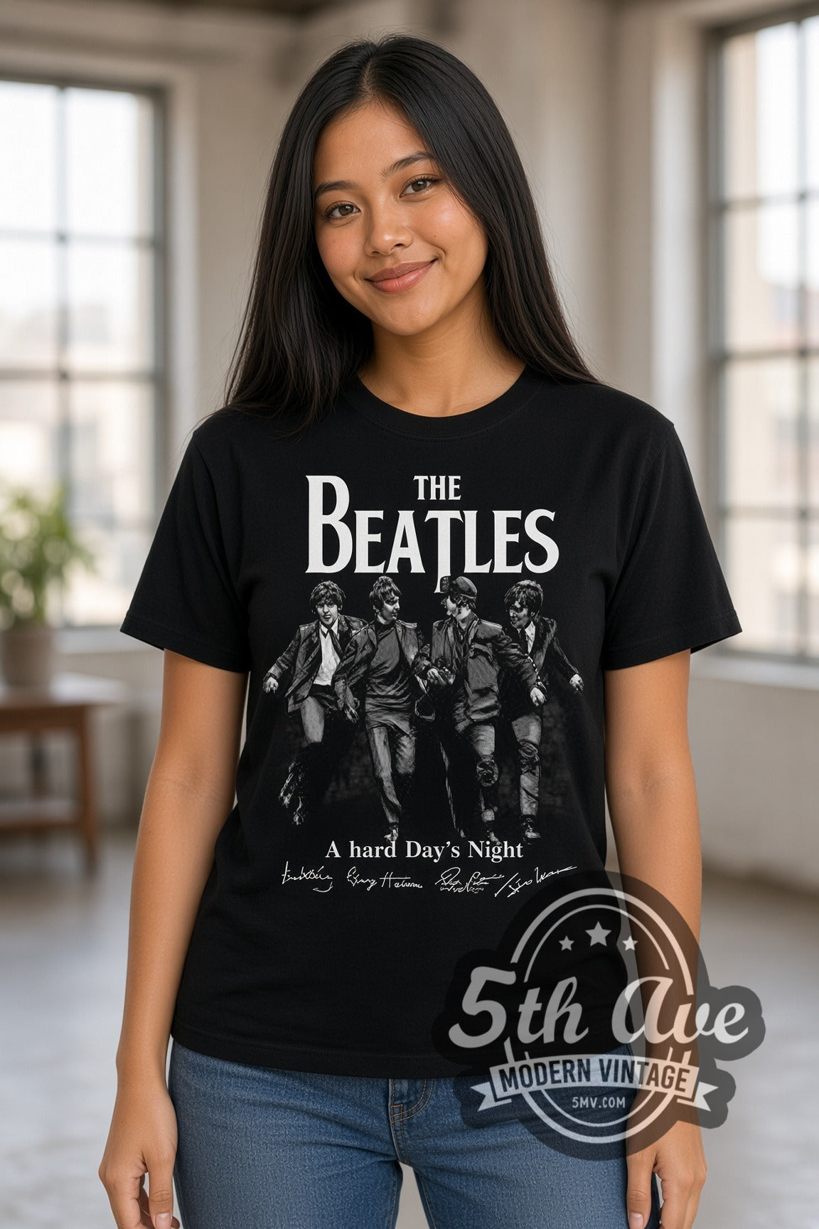Woman wearing The Beatles A Hard Day's Night Walking double stitched black graphic tee