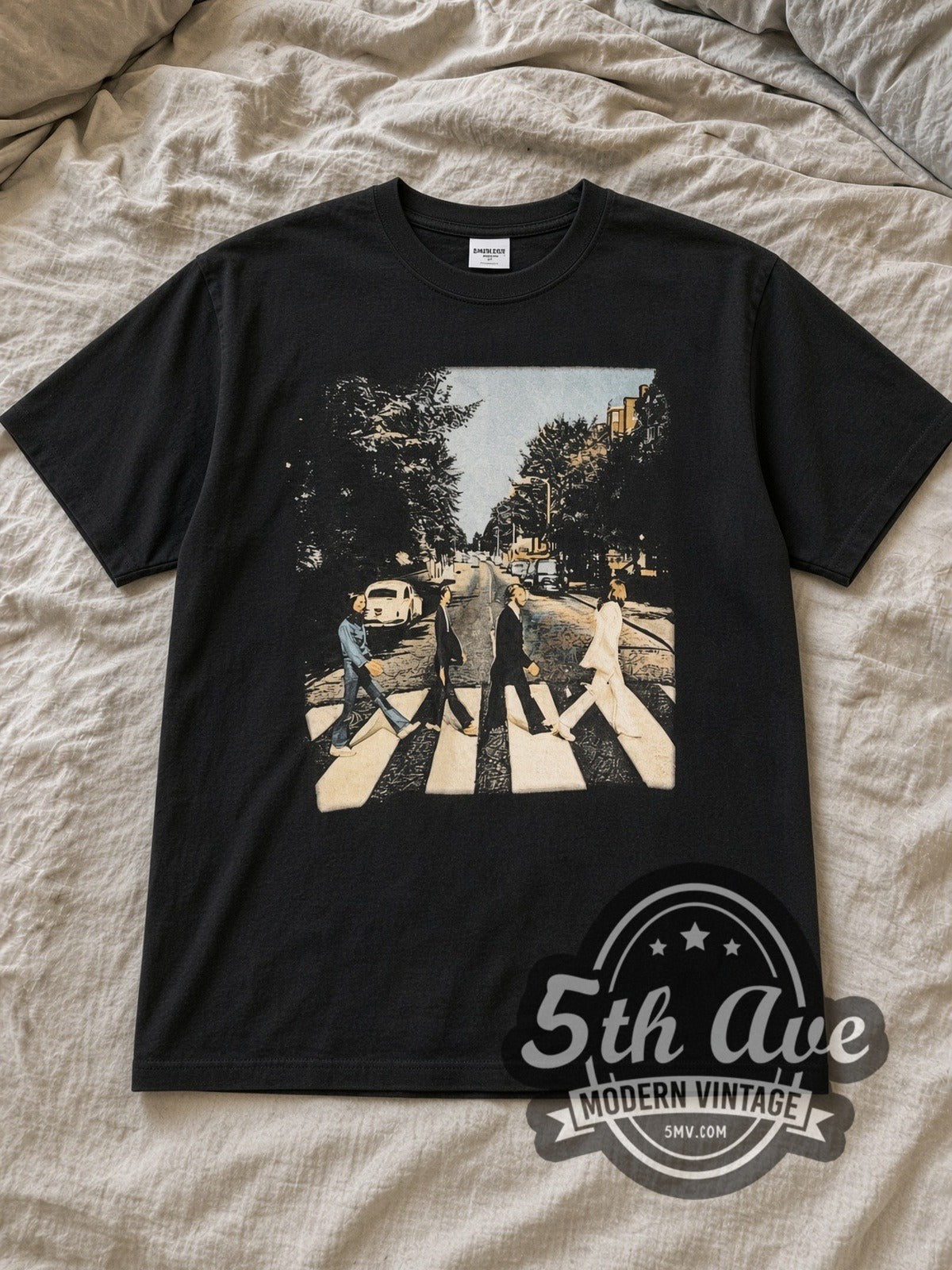 Black The Beatles Abbey Road Crossing Wall Sign Back Vintage Band T-Shirt laid flat on a linen bed