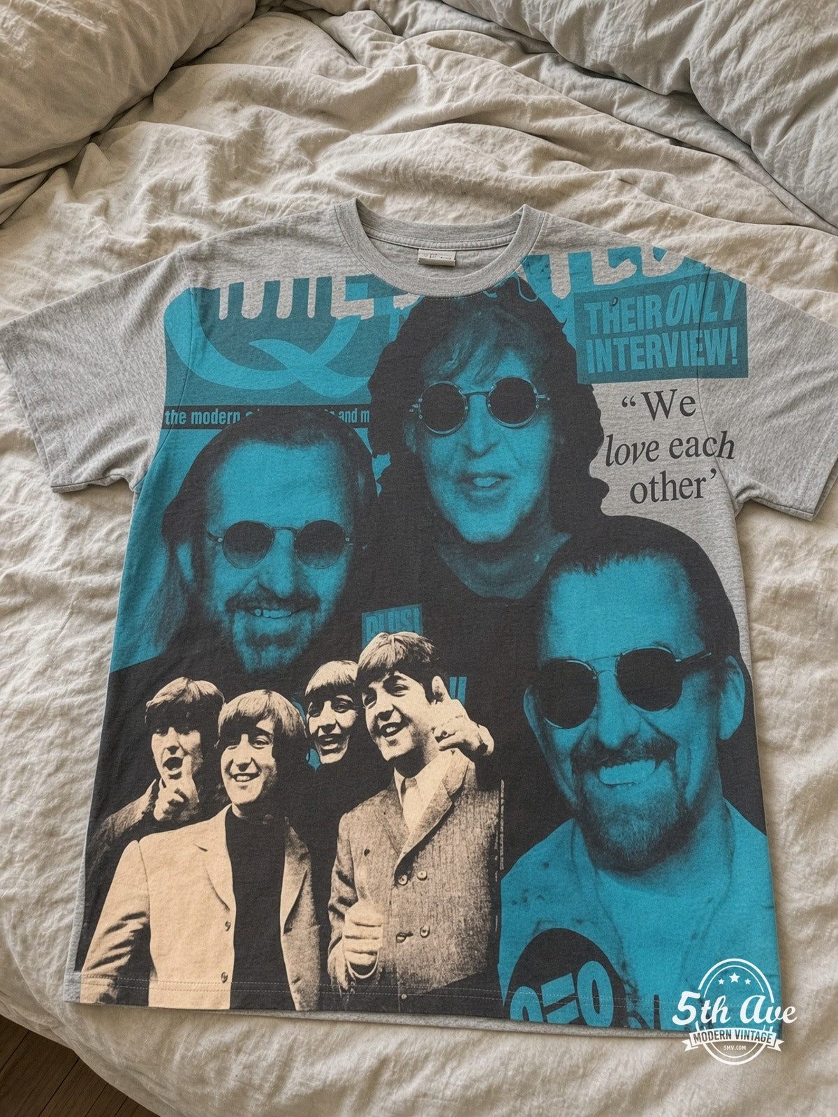 The Beatles Fab Four Collage all over print vintage tee laid on bed