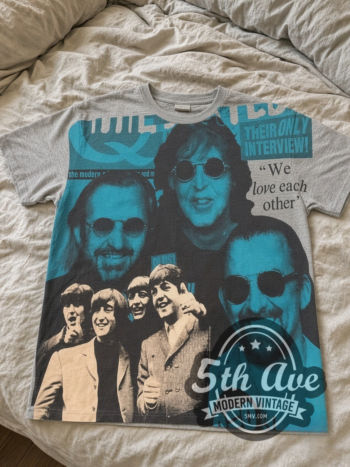 The Beatles Fab Four Collage all-over-print vintage band tee laid flat