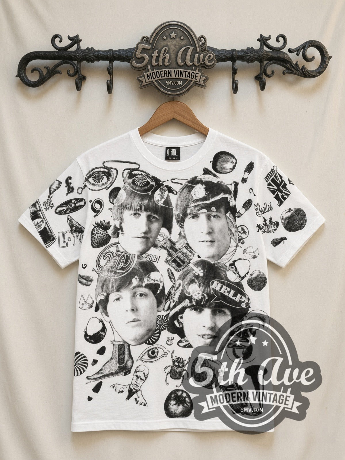 The Beatles Help Collage all-over-print vintage band t-shirt in white, front view on a display rack