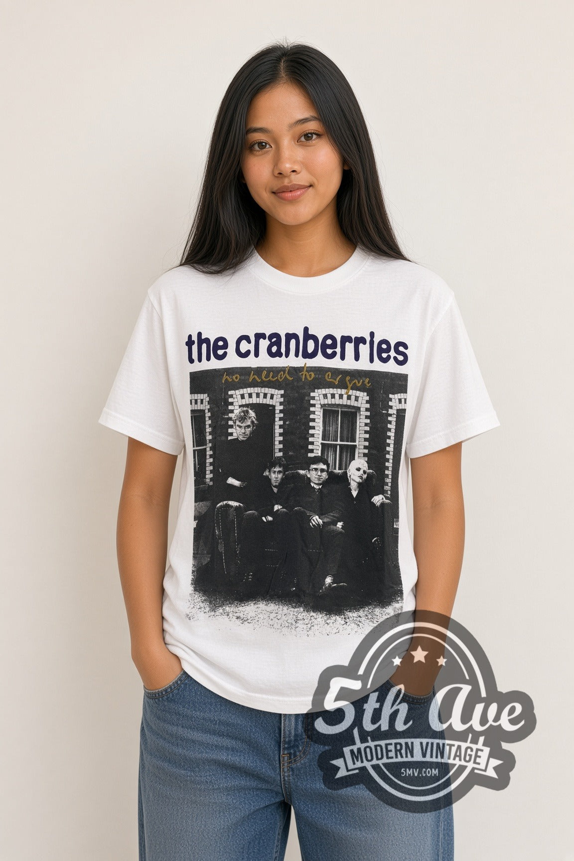 Woman wearing white The Cranberries vintage band t-shirt