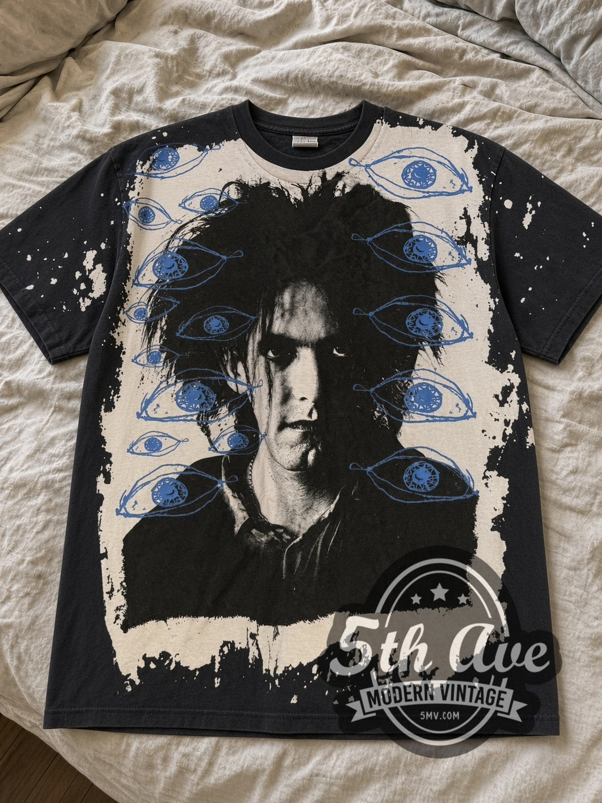 Black The Cure Robert Smith all over print tee laid flat on linen bed