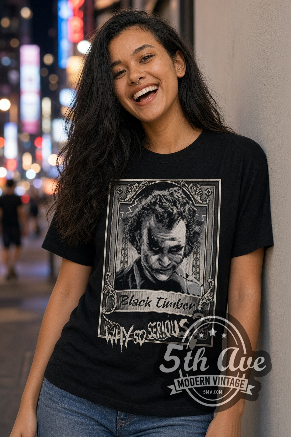 Woman wearing The Dark Knight Joker Black Timber Portrait double stitched black graphic tee