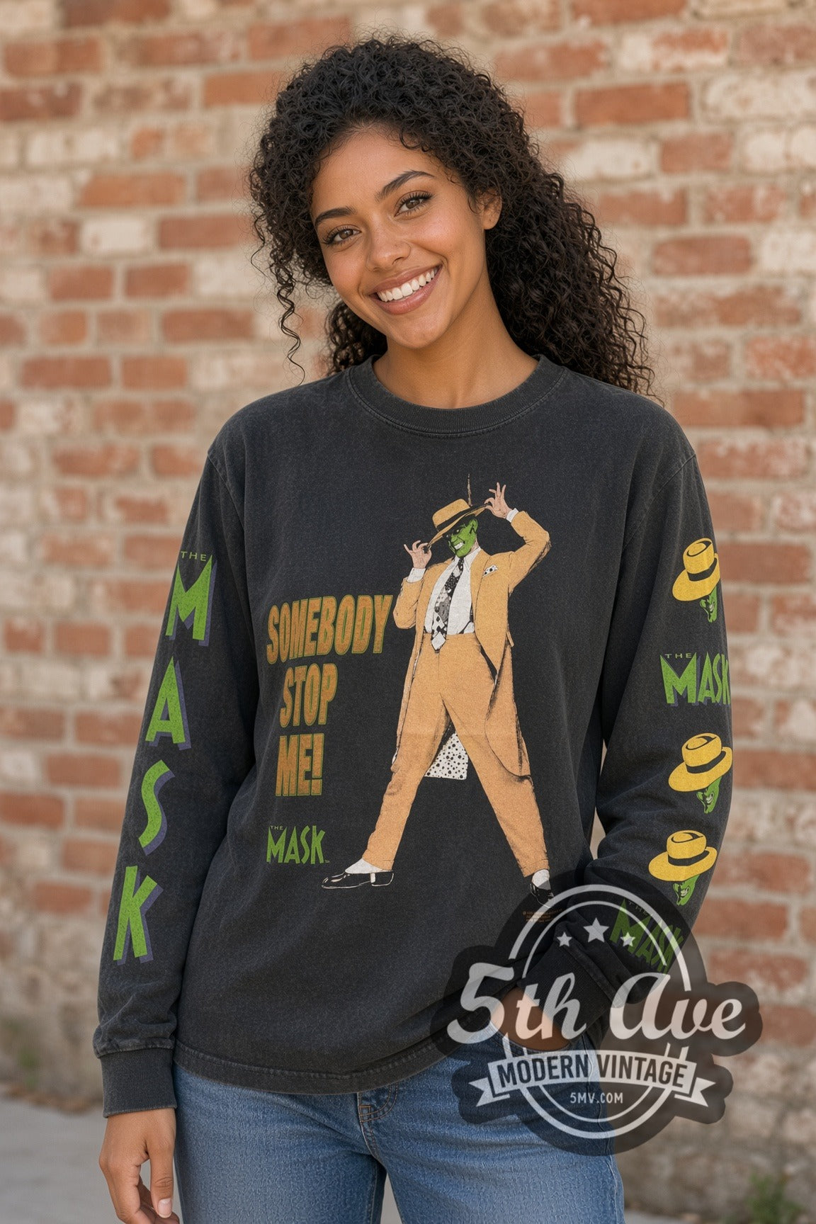 Woman wearing faded black The Mask Somebody Stop Me! / Smokin! vintage movie tee