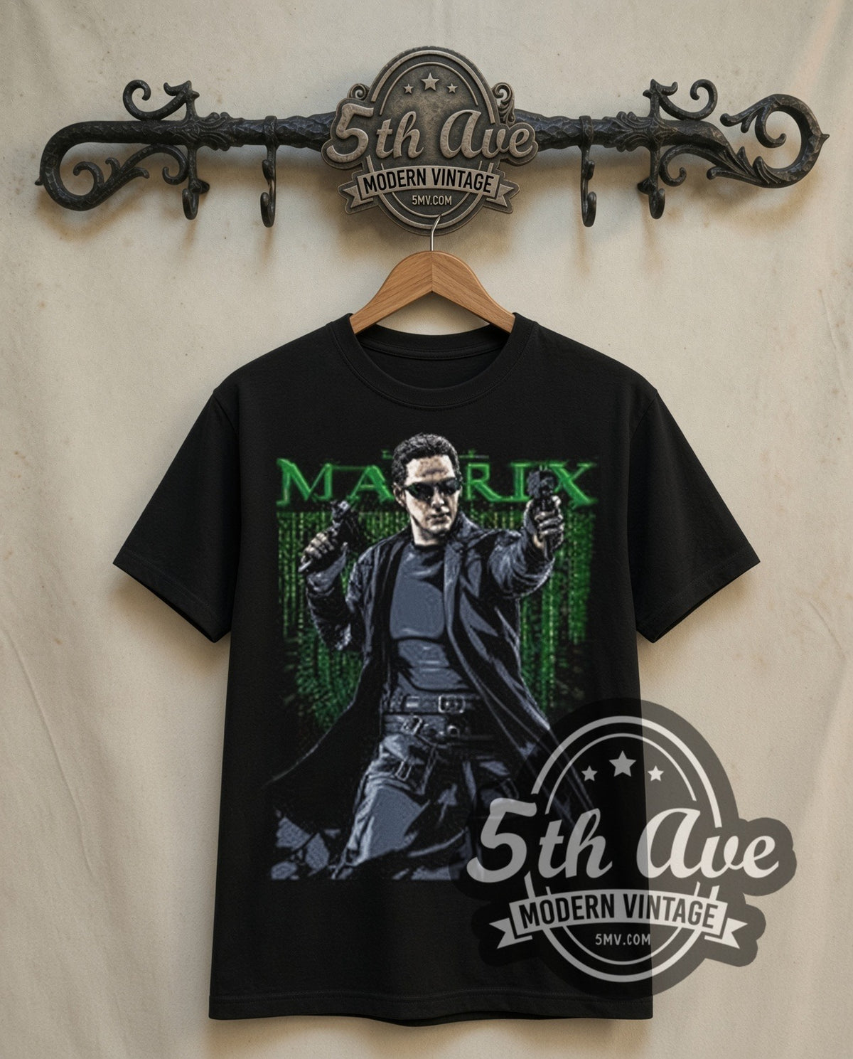 The Matrix Neo with Pistols double stitched black tee front on dark iron 5th Ave rack