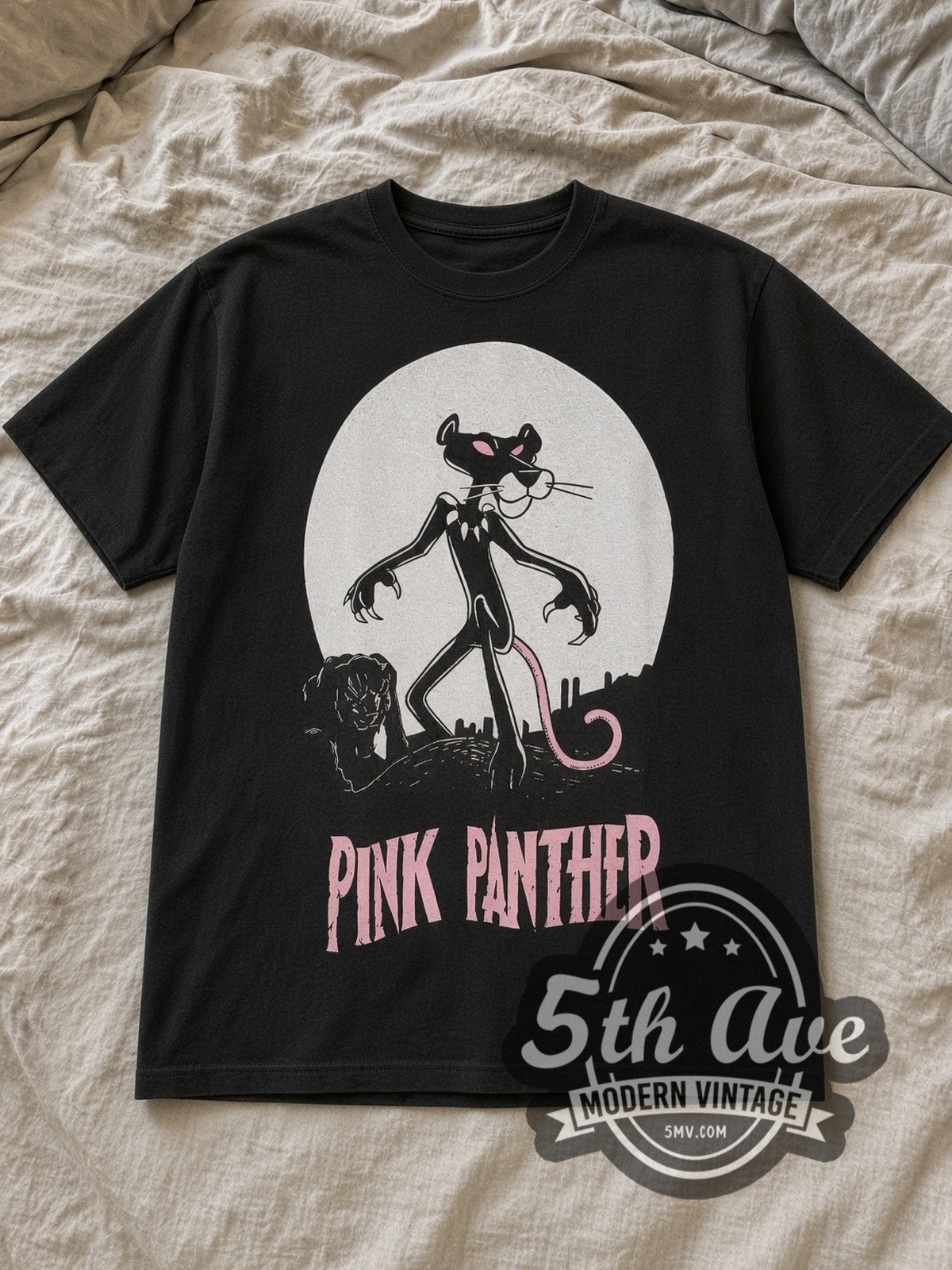 Black The Pink Panther Its Always Pink Inside Vintage Cartoon T-Shirt laid flat on a linen bed