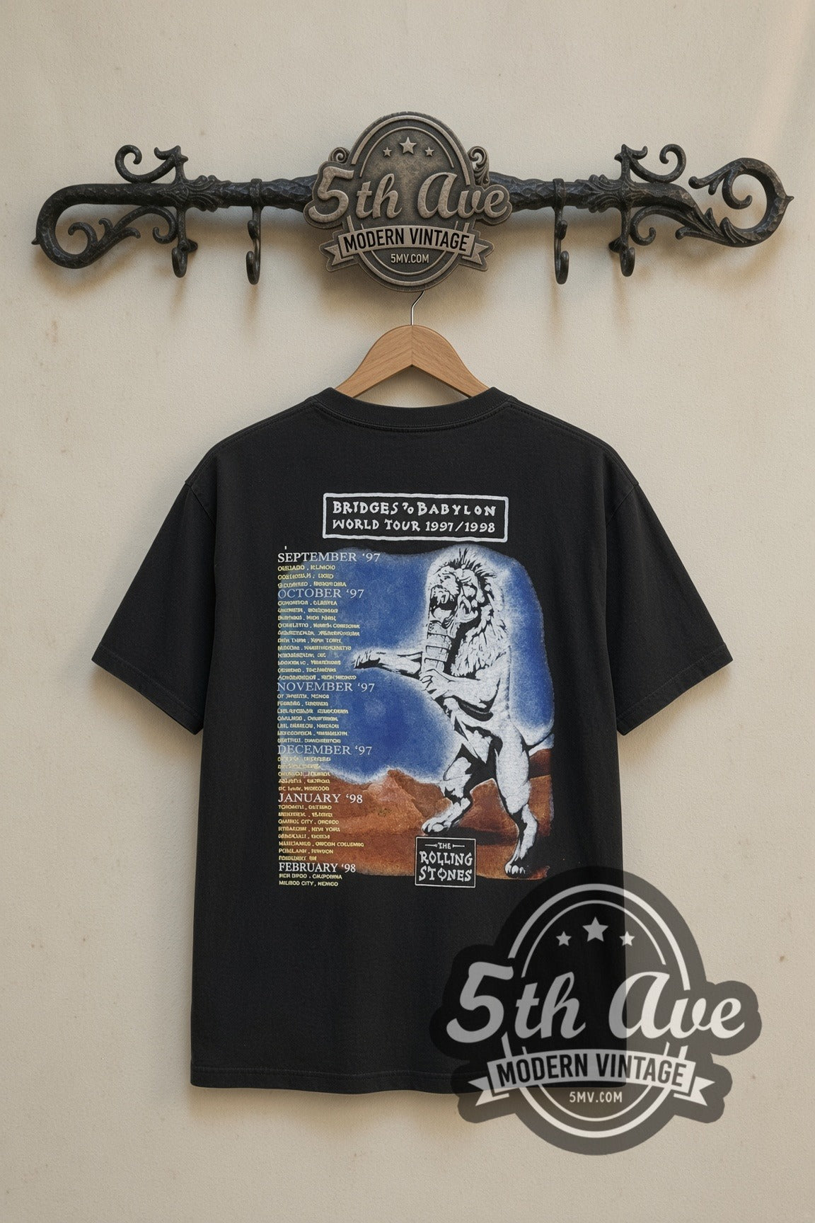 The Rolling Stones Bridges to Babylon Lion band t-shirt in black, back view on a display rack