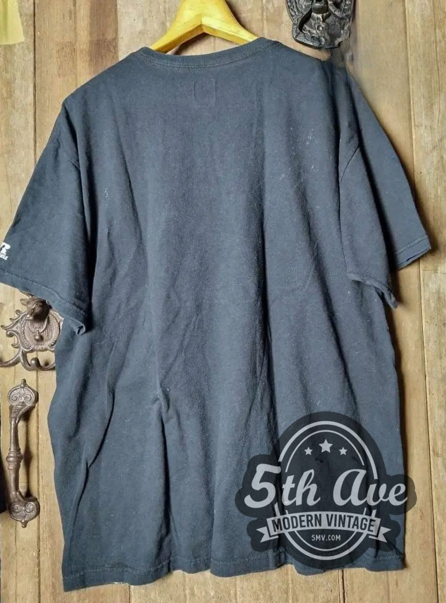 The Rolling Stones - vintage band t-shirt hanging on a hanger