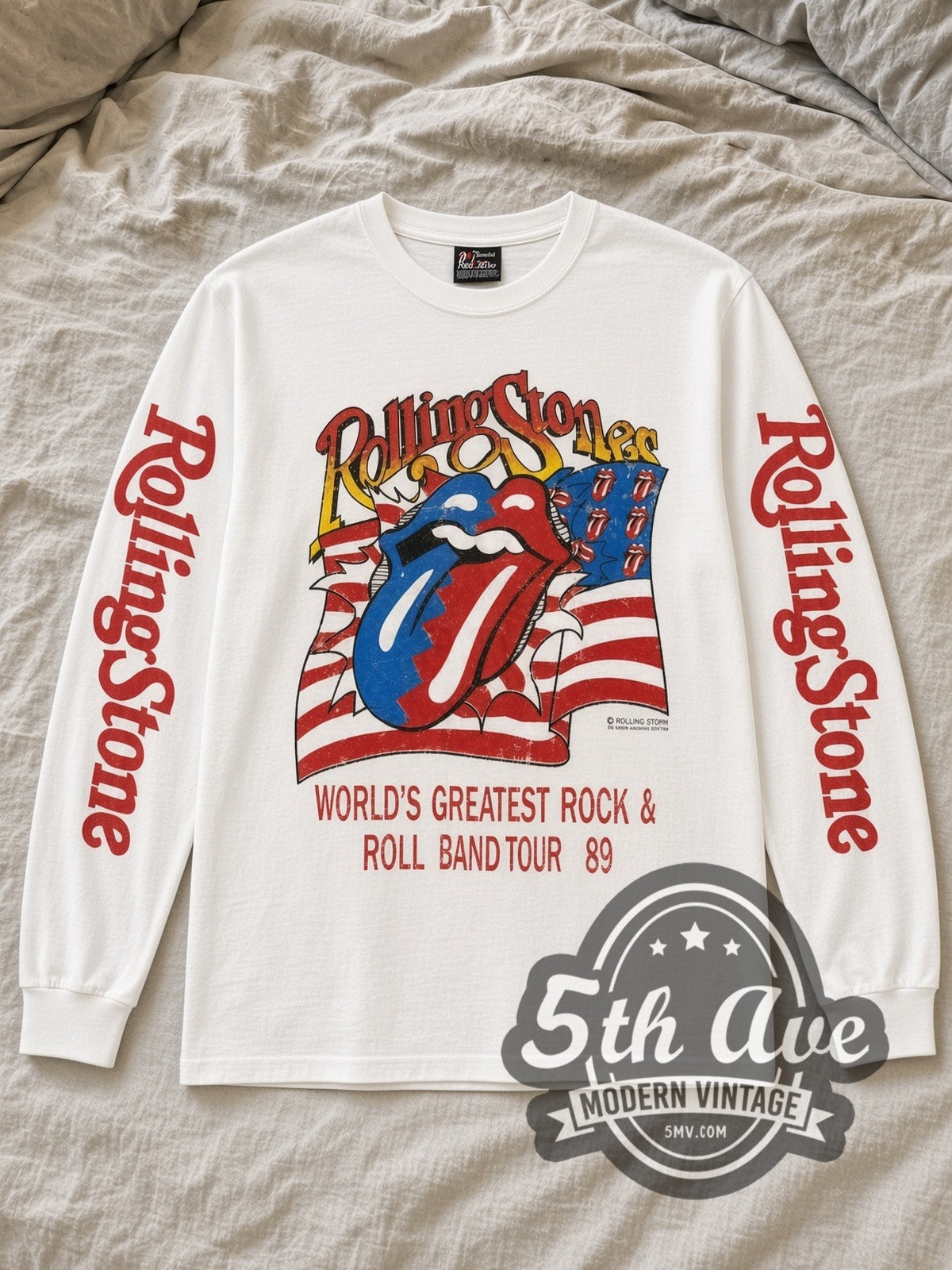 White The Rolling Stones Tour 89 Tongue Flag Vintage Band Long Sleeve T-Shirt laid flat on a linen bed
