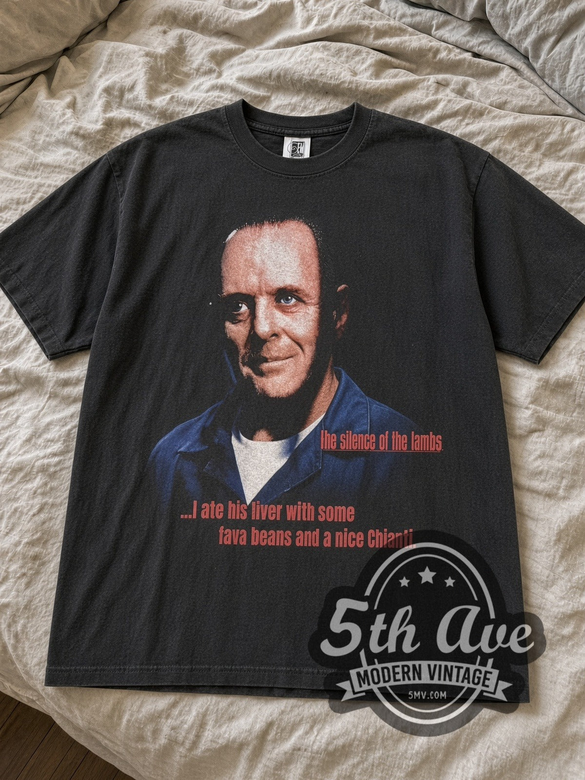 Black Silence of the Lambs Lecter tee laid flat on linen bed