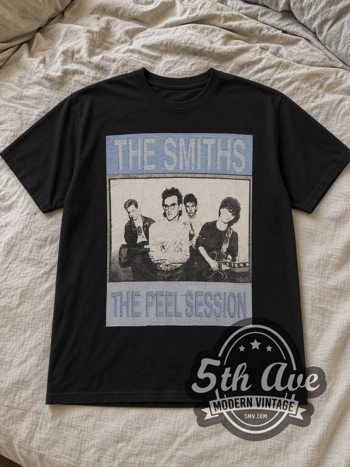 Black The Smiths The Peel Sessions Band Photo Vintage Band T-Shirt laid flat on a linen bed