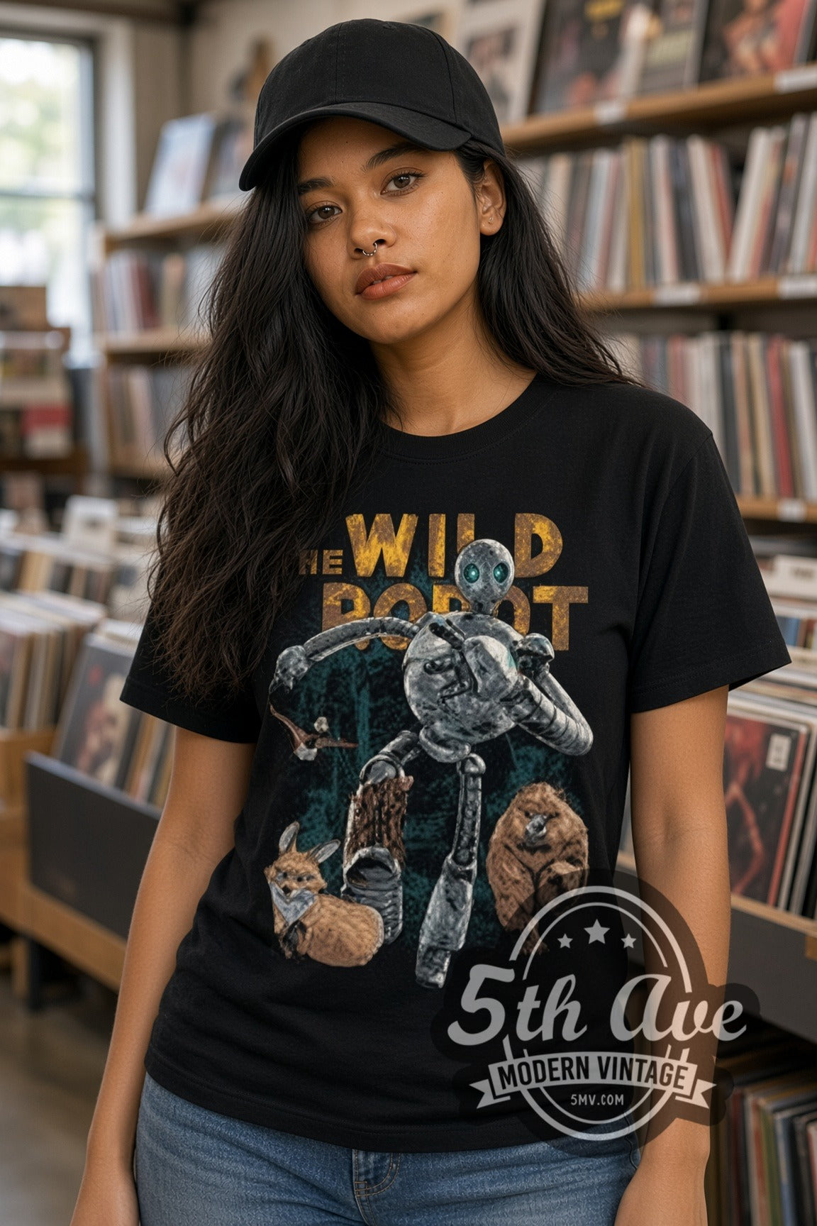 Woman wearing The Wild Robot Roz double stitched black graphic tee