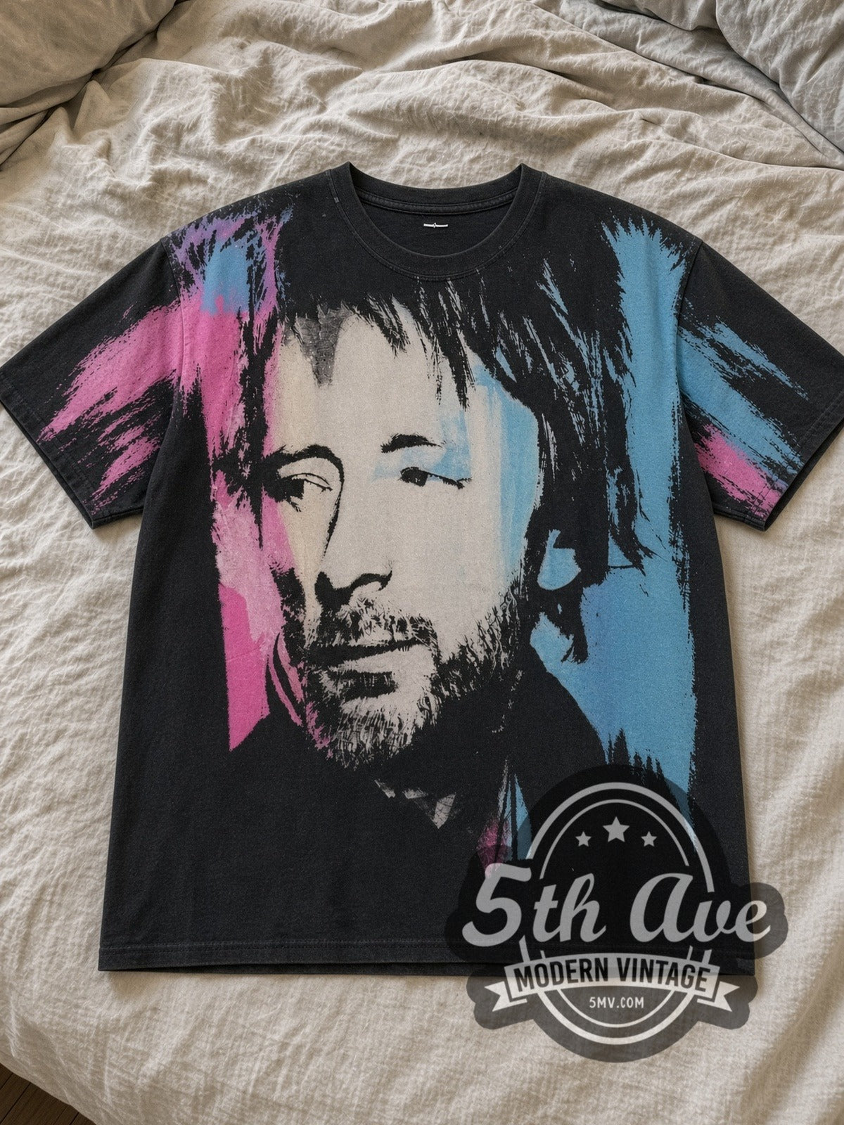 Black Thom Yorke All Over Print Portrait Vintage Band T-Shirt laid flat on a linen bed