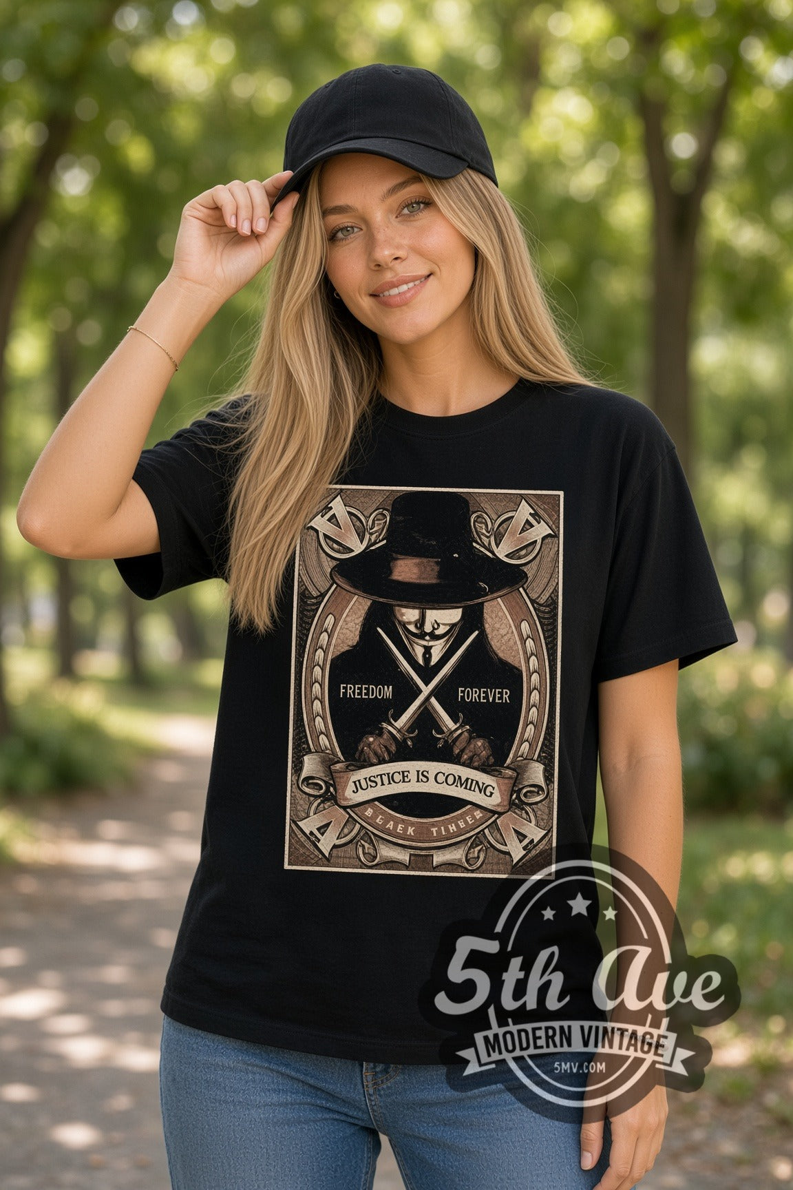 Woman wearing V for Vendetta Justice Is Coming Frame double stitched black graphic tee