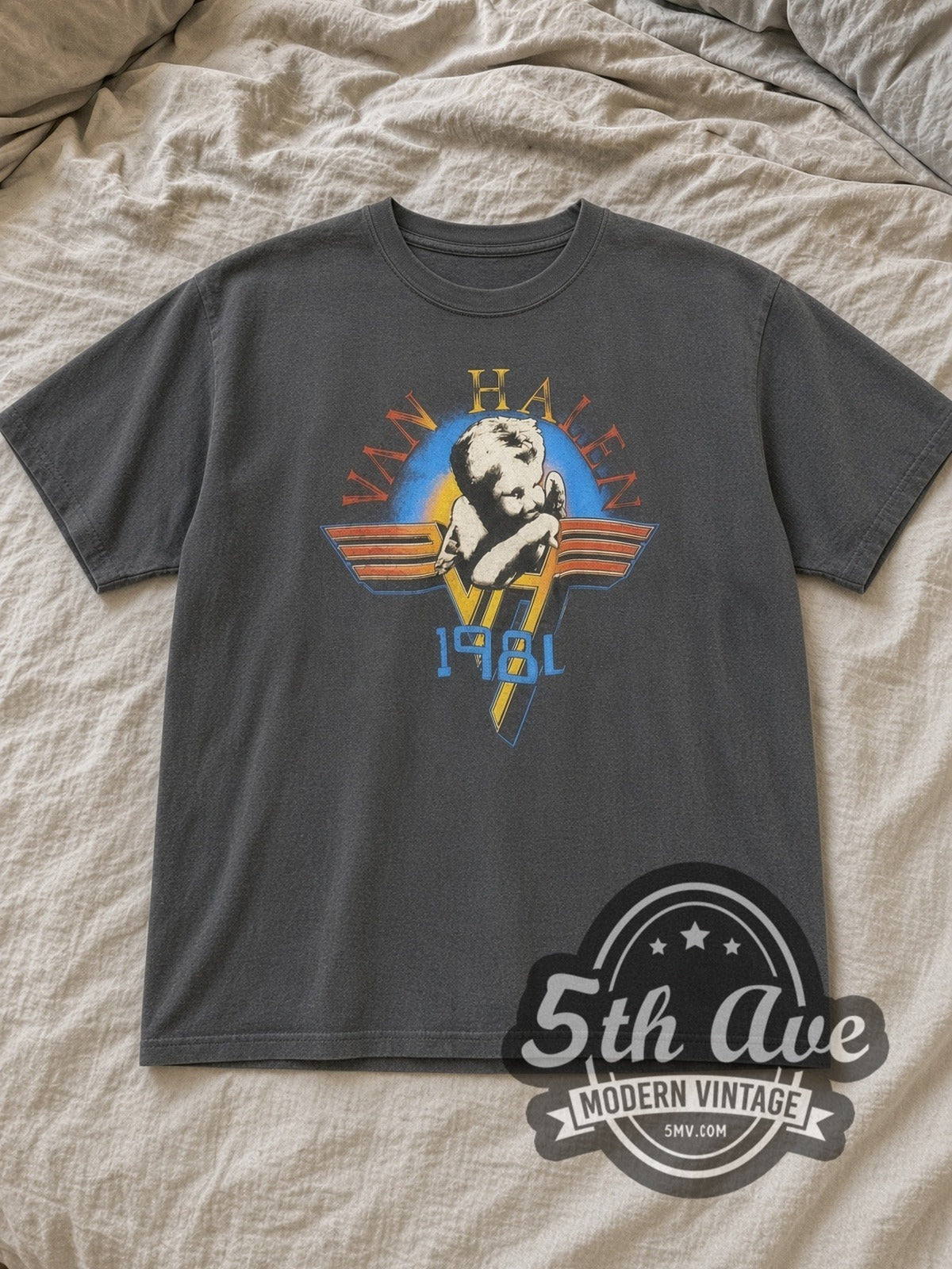 Charcoal Van Halen Vintage Band T-Shirt laid flat on a linen bed