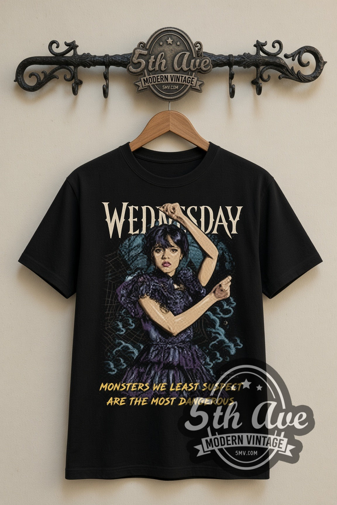 Wednesday Dancing Wednesday Monsters We Least Suspect double stitched black tee front on dark iron 5th Ave rack