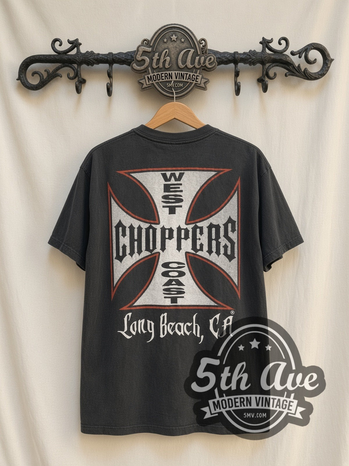 West Coast Choppers Iron Cross Long Beach vintage graphic t-shirt, back view on a display rack