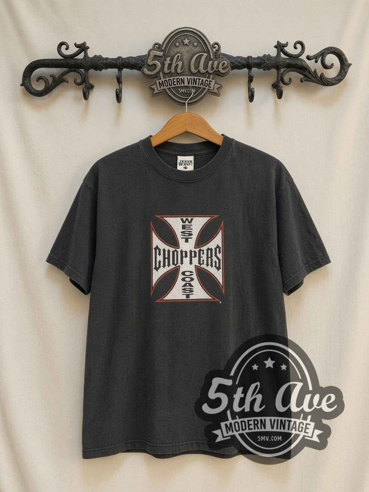 West Coast Choppers Iron Cross Long Beach vintage graphic t-shirt, front view on a display rack