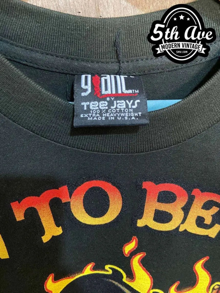 Model wearing Betty Boop – Wild at Heart: Betty Boop Born to Be Wild Single Stitch Black t shirt – New Vintage Graphic Tee vintage band tee