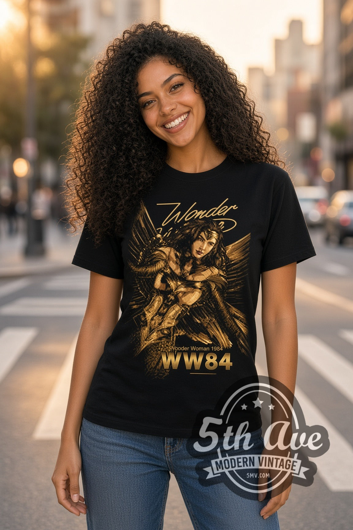 Woman wearing Wonder Woman 1984 Golden Armor double stitched black graphic tee