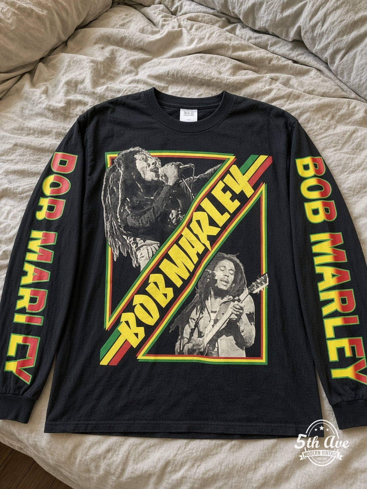 ETS LS 01 Bob Marley Diagonal Photos long sleeve vintage tee laid on a bed