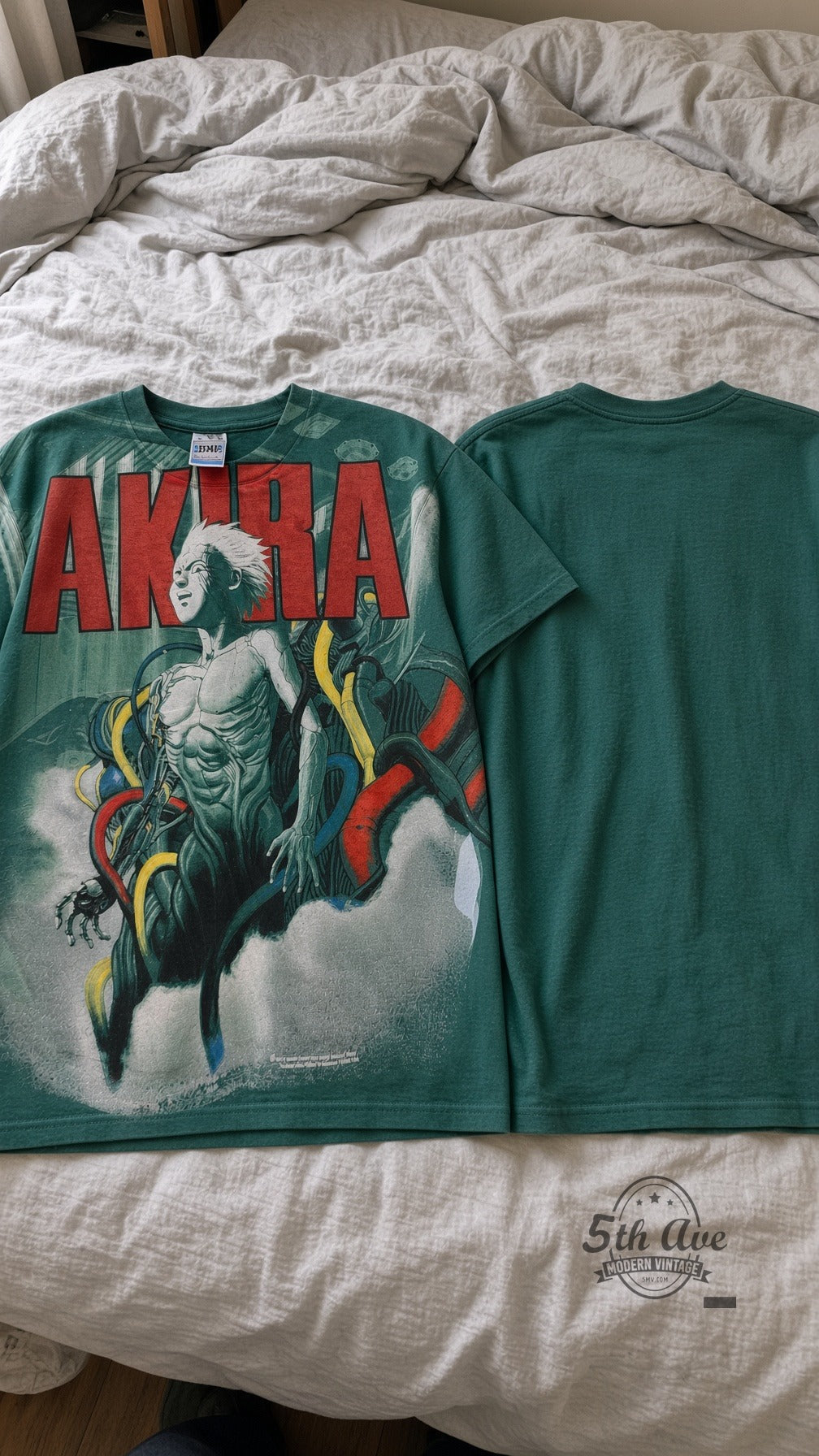 Akira vintage band t-shirt on bed