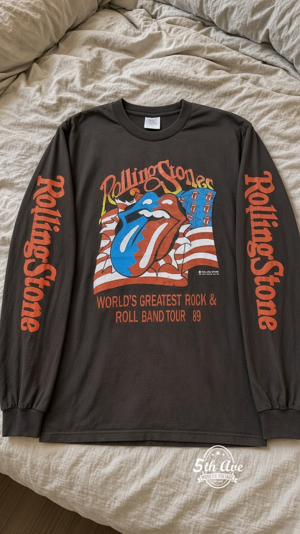 ETS LS 05 The Rolling Stones World's Greatest Rock and Roll Band Tour 89 long sleeve vintage tee laid on a bed