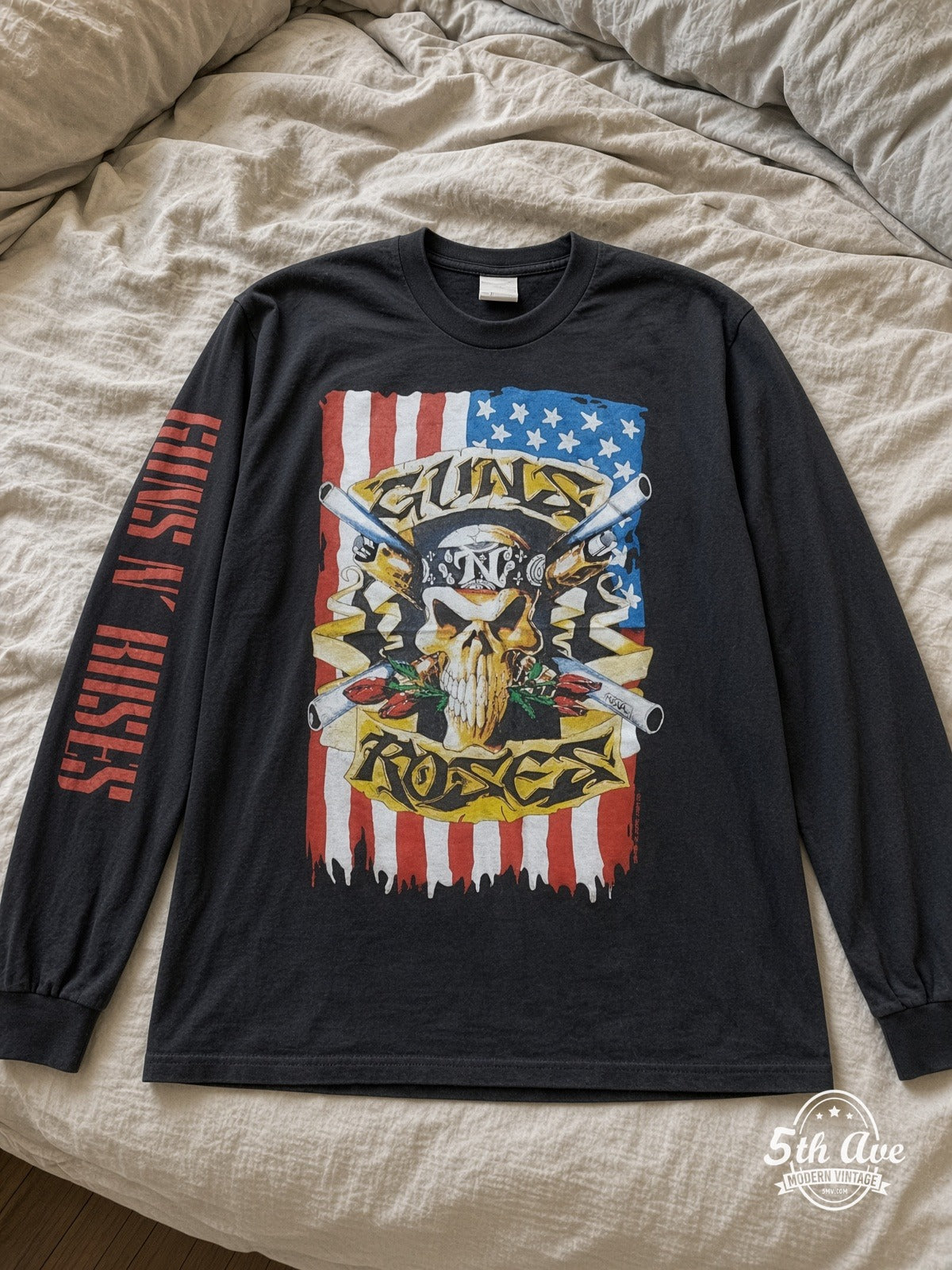 ETS LS 09 Guns N' Roses Skull Crossed Guns Flag long sleeve vintage tee laid on a bed