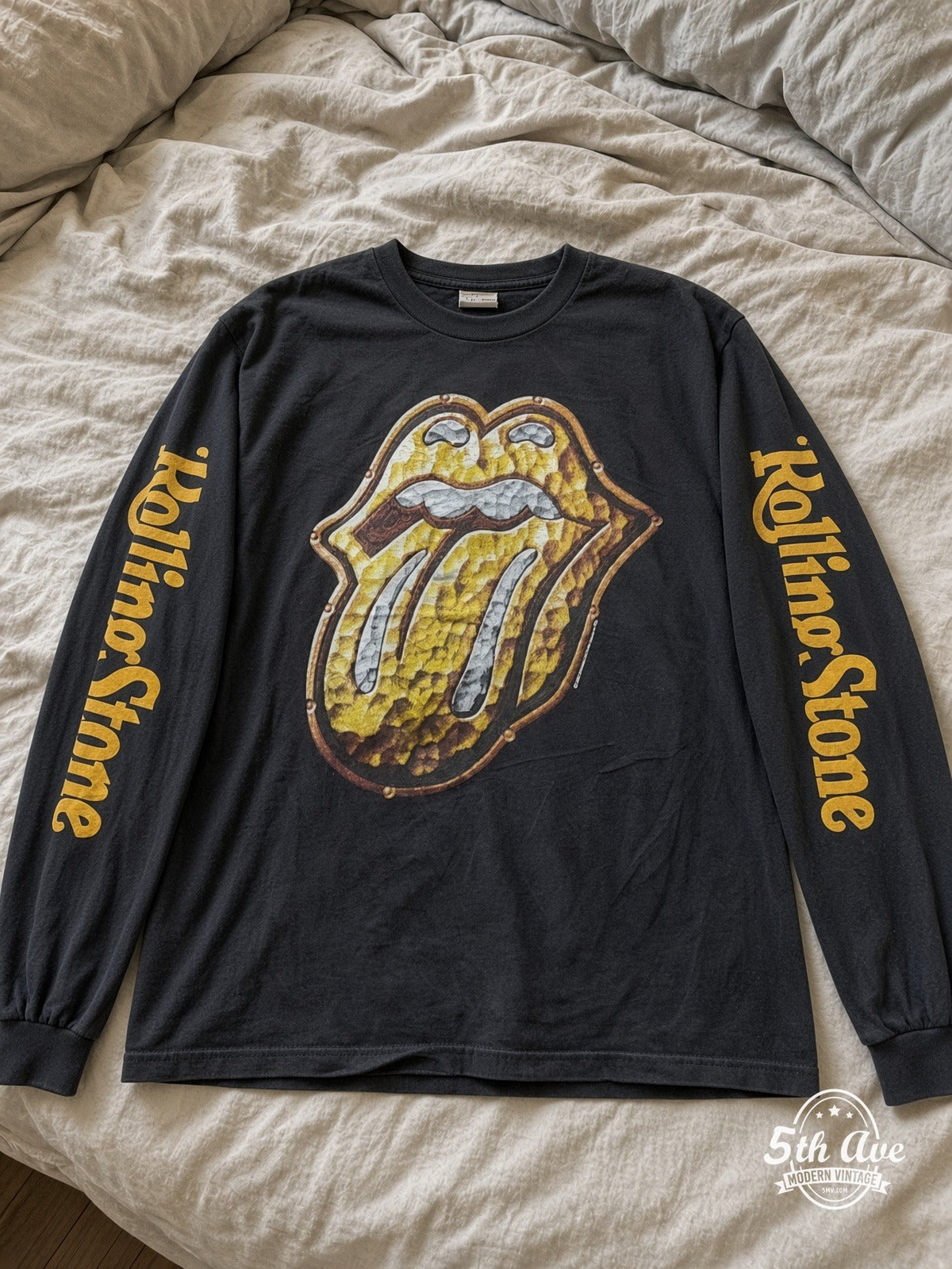 ETS LS 10 The Rolling Stones Gold Tongue long sleeve vintage tee laid on a bed