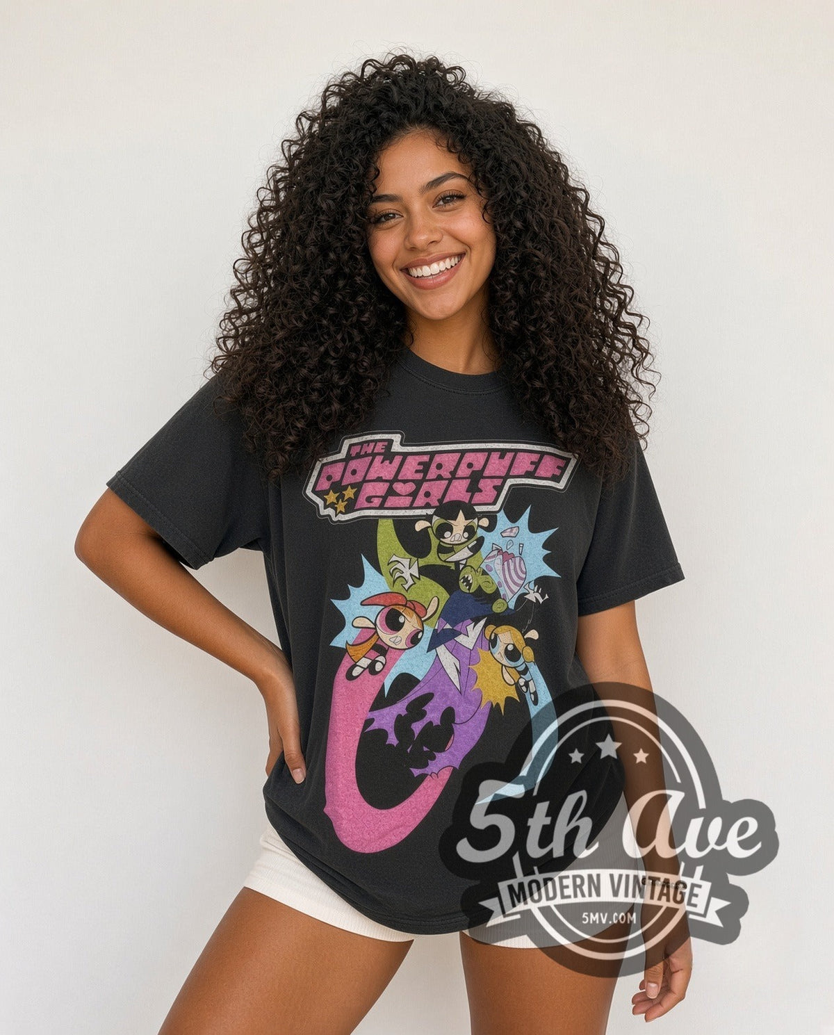 Model wearing The Powerpuff Girls Vs. Mojo Jojo vintage cartoon tee in black