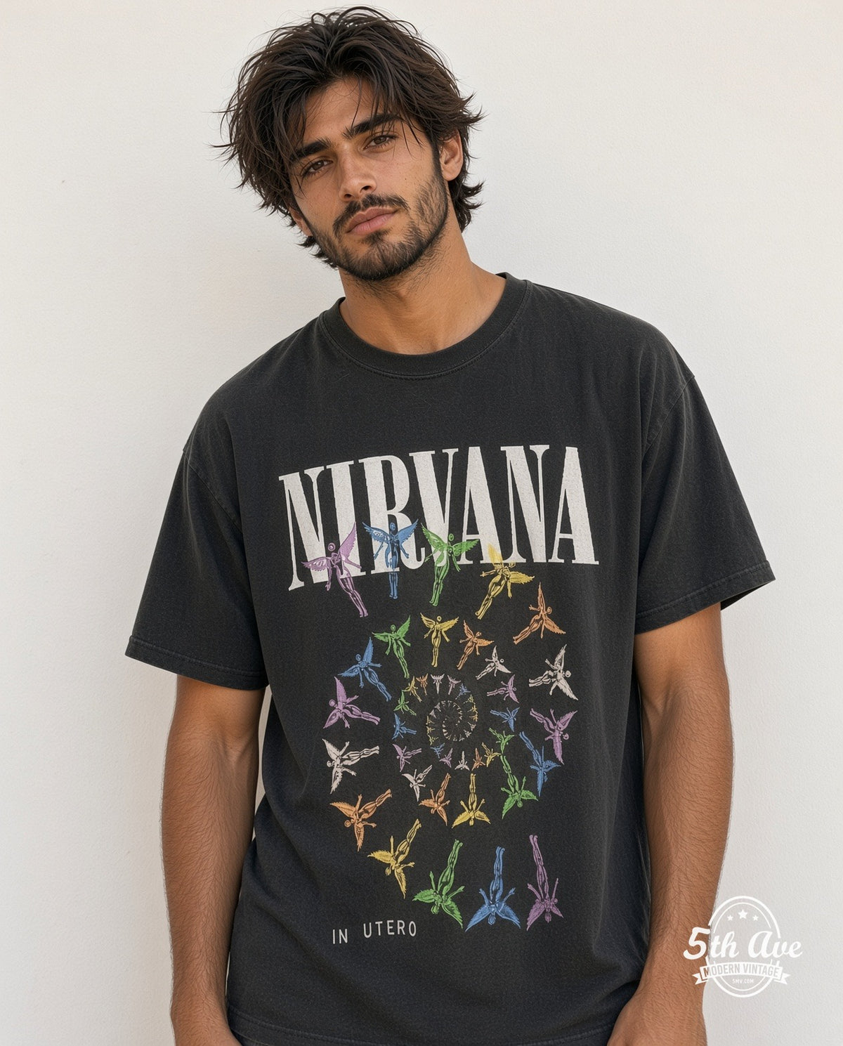 Model wearing the Nirvana In Utero Colorful Angel vintage band t-shirt in black