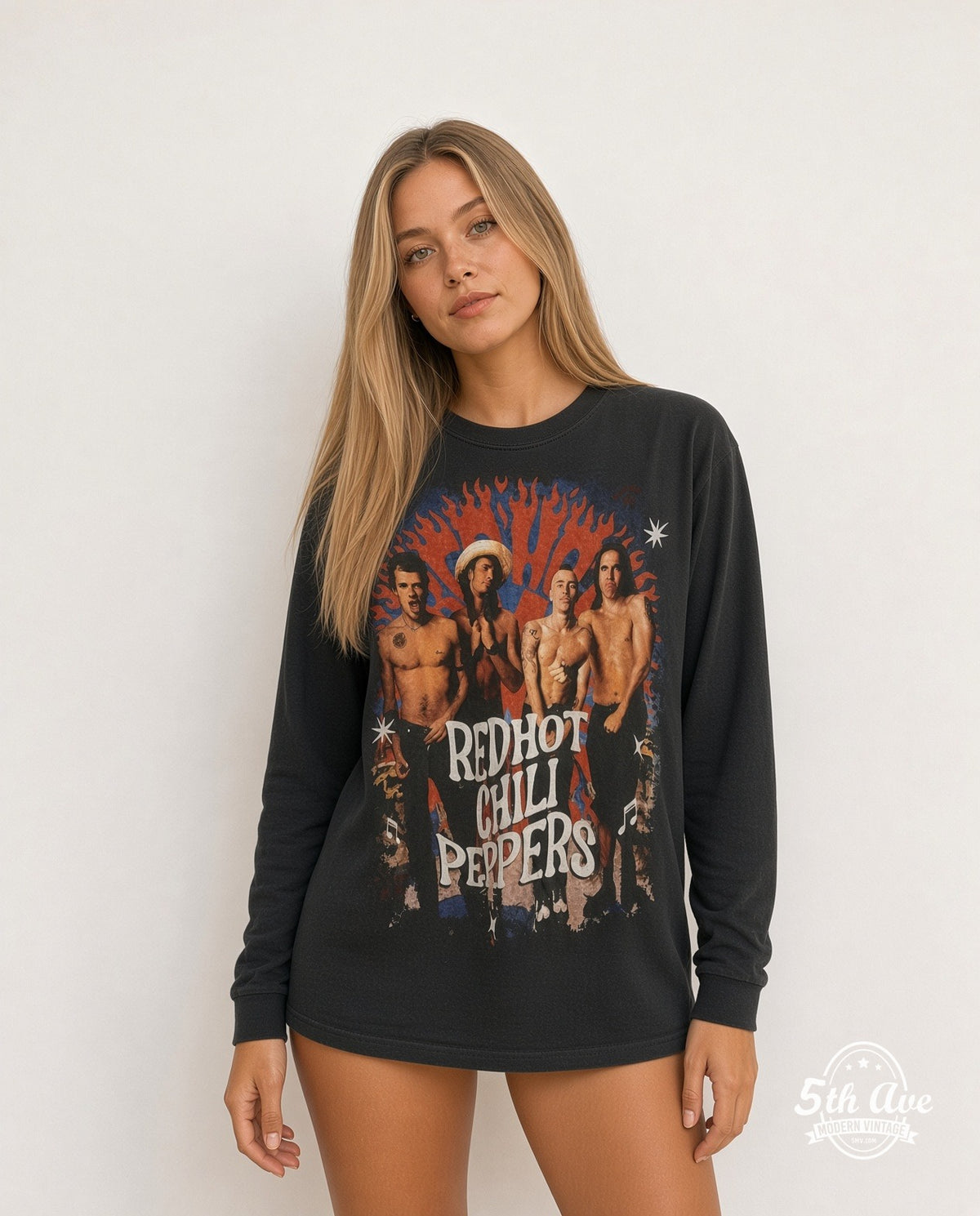 Model wearing the Red Hot Chili Peppers 1982 all-over-print vintage band t-shirt in black