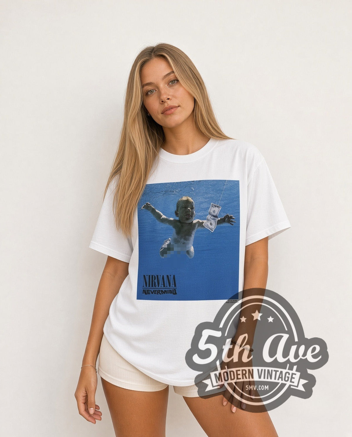 Model wearing the Nirvana Nevermind Album Tracklist vintage band t-shirt in white