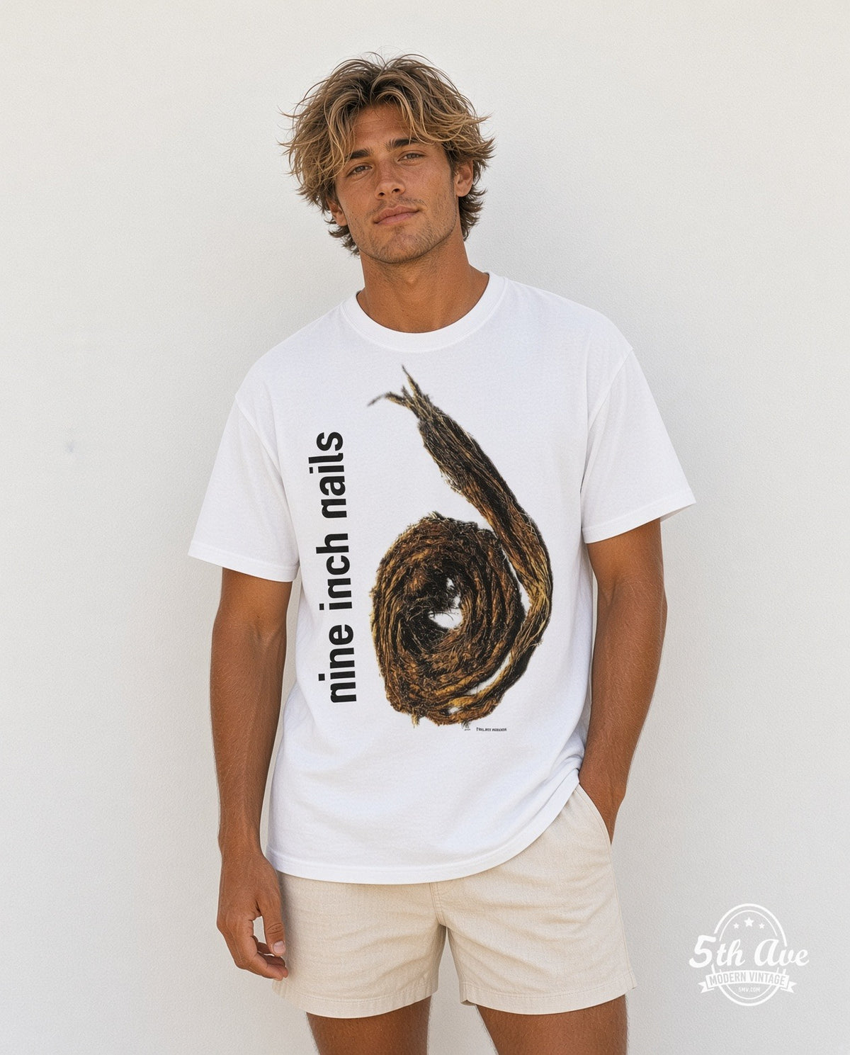Model wearing the Nine Inch Nails Further Down the Spiral White Coiled Rope vintage band t-shirt in white