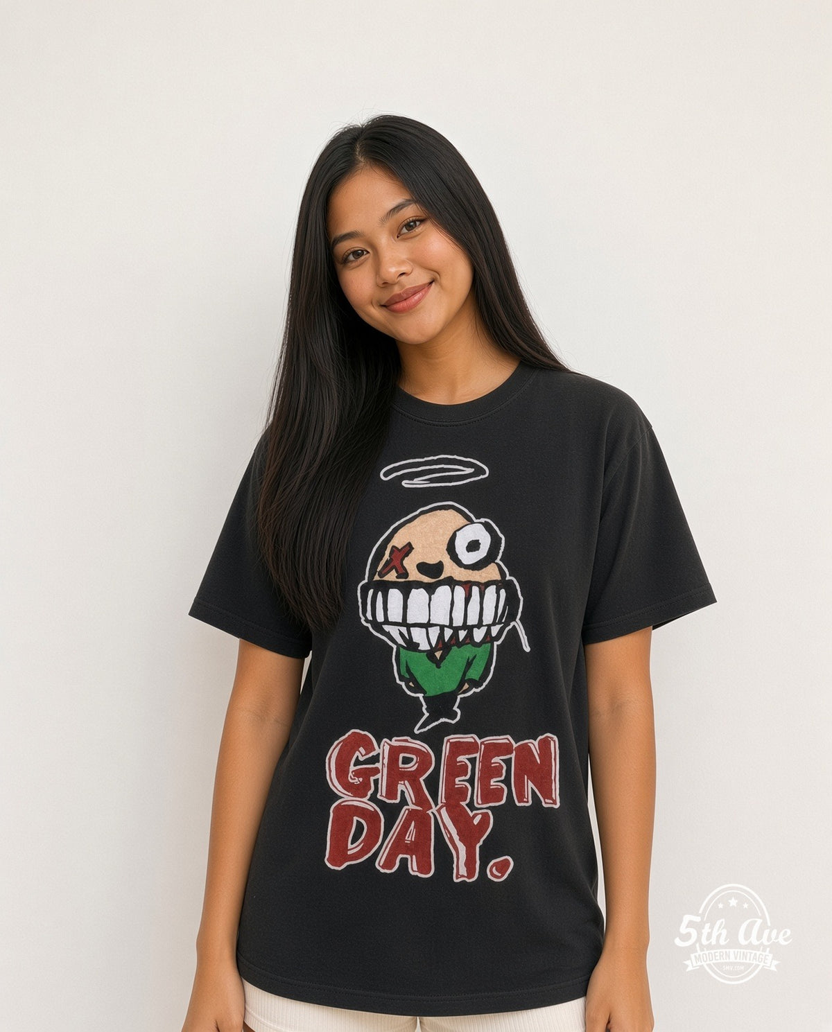 Model wearing the Green Day Smiley vintage band t-shirt in black