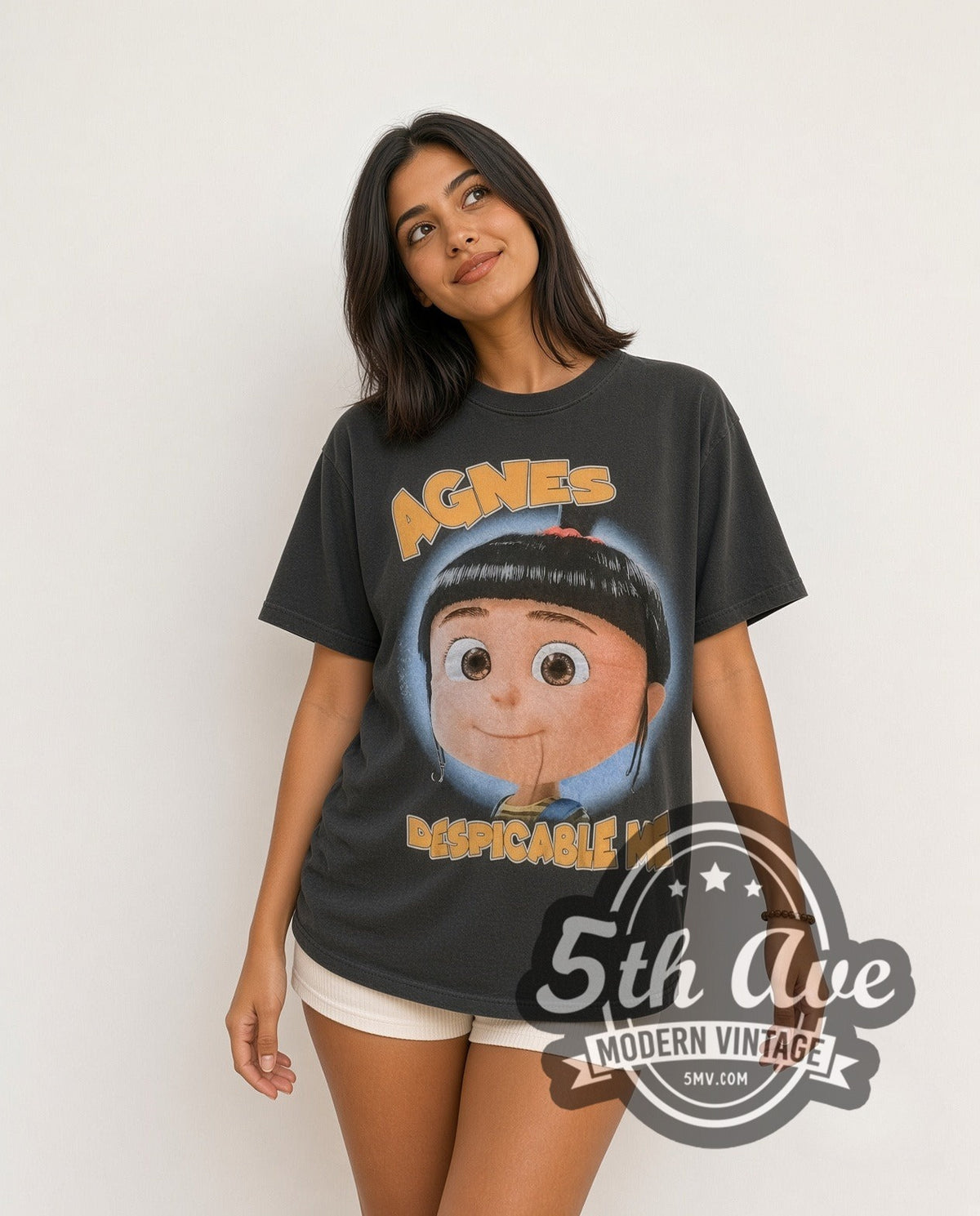 Model wearing the Despicable Me Agnes and Her Unicorn Adventure vintage cartoon t-shirt