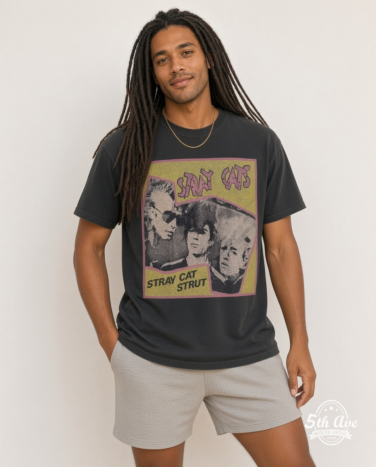 Model wearing the Stray Cats Strut vintage band t-shirt