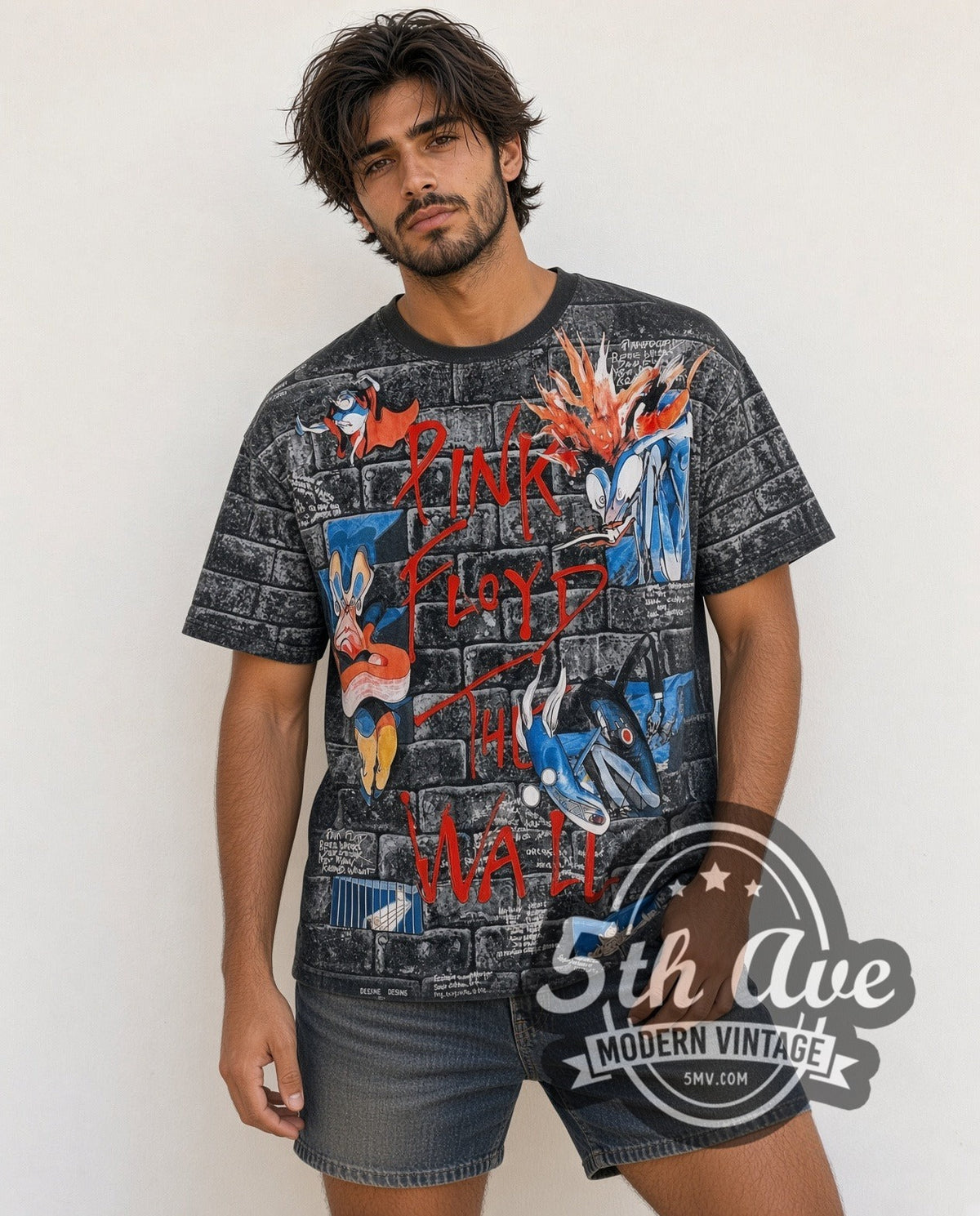 Model wearing the Pink Floyd The Wall Brick Characters all-over-print vintage band t-shirt
